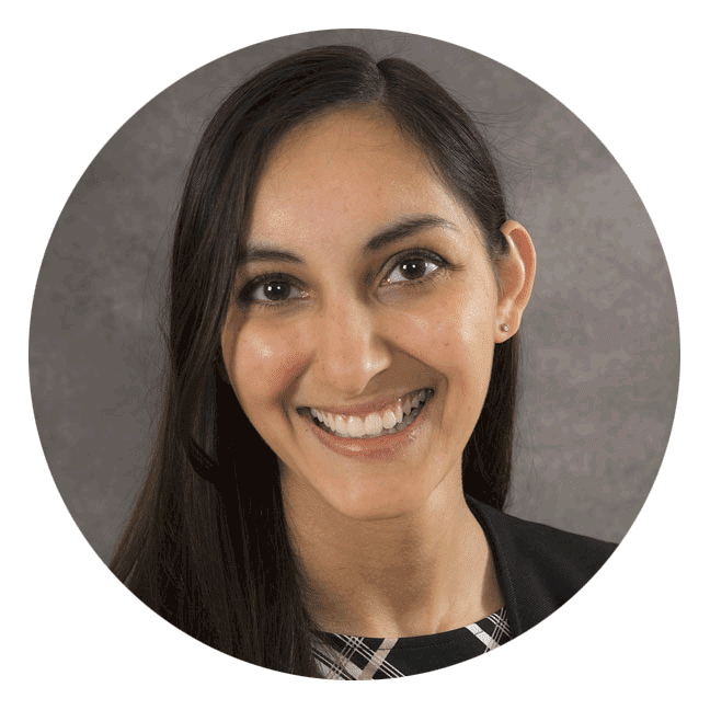 I'm sorry, I can't tell who this person is based on the image. It's a portrait of a smiling person with long hair, against a gray background.